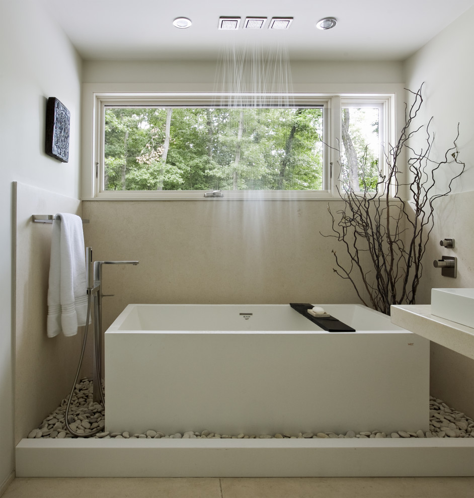 This is an example of a contemporary bathroom in Boston with a freestanding tub.