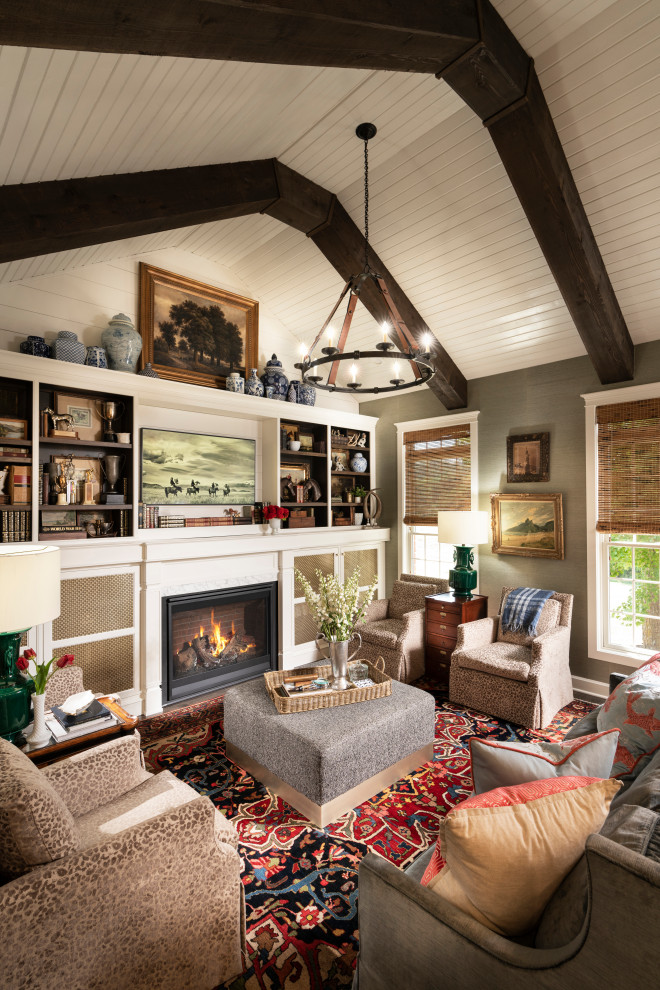 Inspiration for a large transitional open concept family room in Other with white walls, dark hardwood floors, a standard fireplace, a wood fireplace surround, a wall-mounted tv and vaulted.