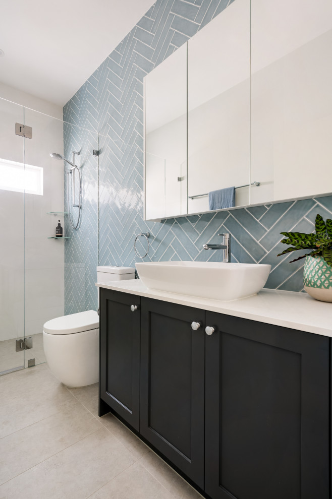 Inspiration for a transitional master bathroom in Sydney with shaker cabinets, grey cabinets, subway tile, porcelain floors, engineered quartz benchtops, a hinged shower door, white benchtops, a single vanity and a freestanding vanity.