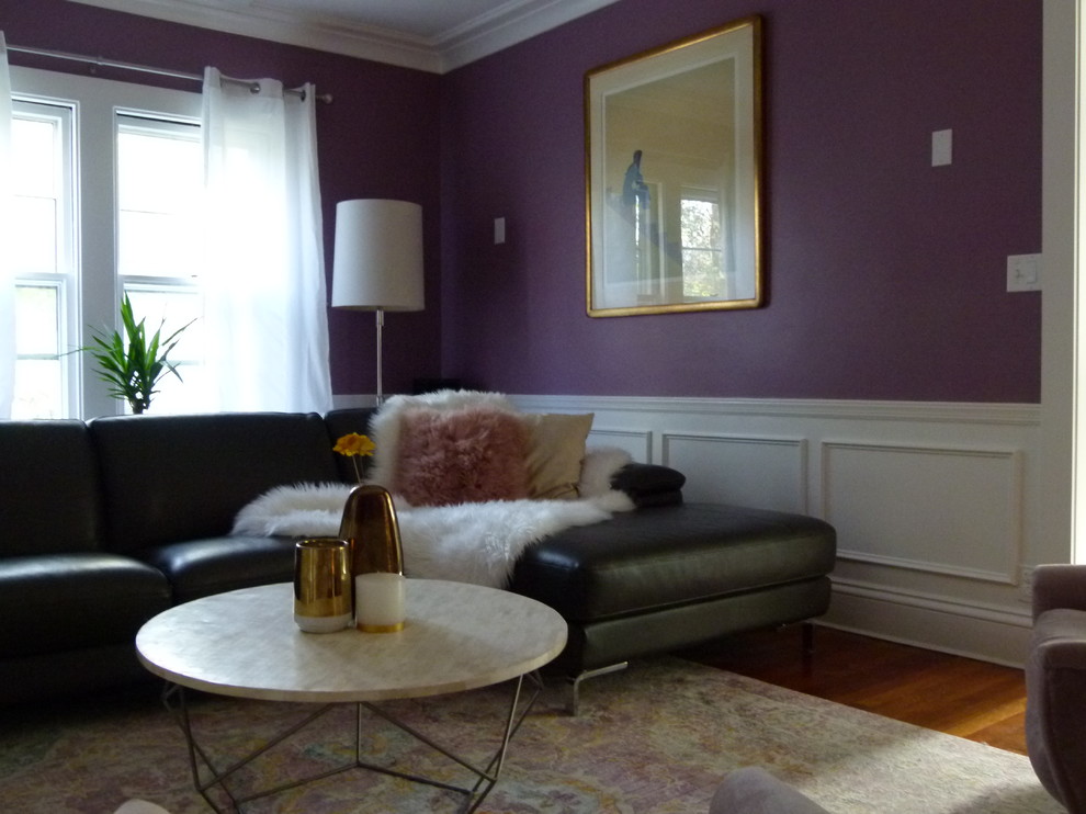 Photo of a mid-sized traditional formal enclosed living room in New York with purple walls, dark hardwood floors, no fireplace, no tv and brown floor.