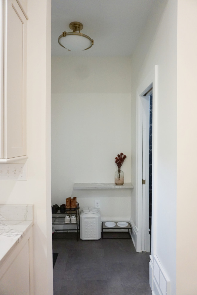 Transitional vinyl floor and gray floor kitchen photo with an undermount sink, shaker cabinets, gray cabinets, quartzite countertops, stone slab backsplash, stainless steel appliances and an island