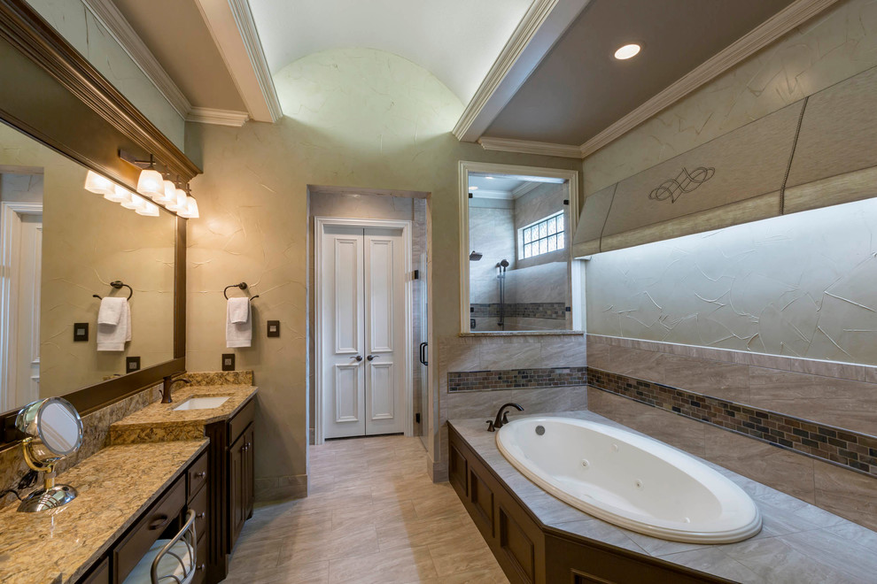 Bathroom - transitional master bathroom idea in Dallas with an undermount sink, quartzite countertops and beige walls