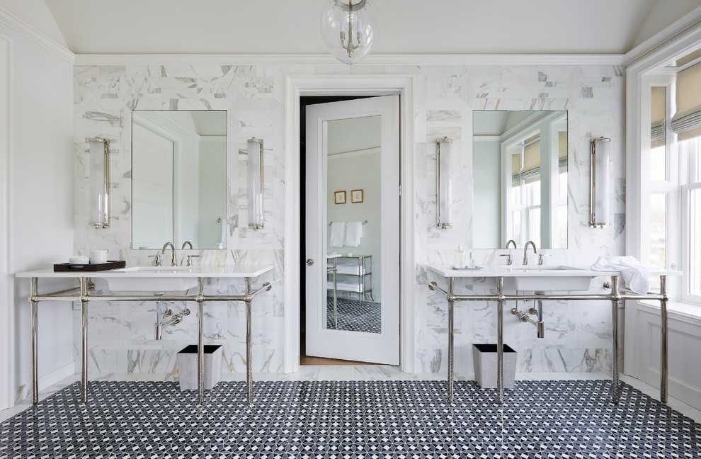 Large transitional master bathroom in New York with porcelain floors, white walls and a console sink.
