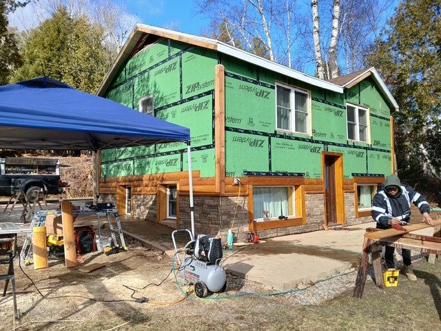 Log Siding, Stamped Concrete and Post and Beam Carport