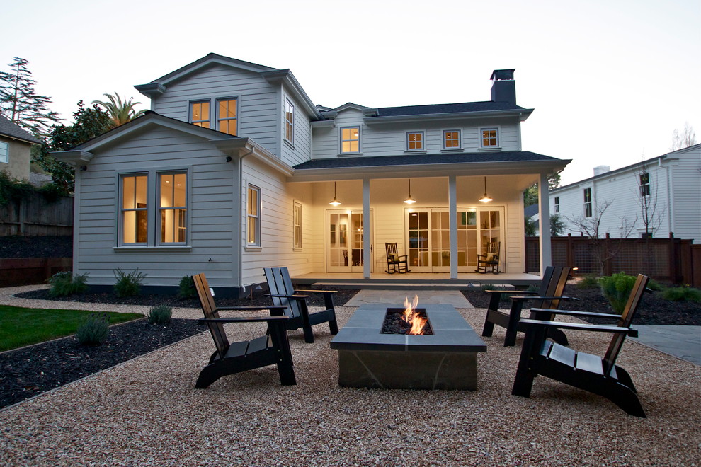 Inspiration for a country backyard patio in San Francisco with a fire feature.