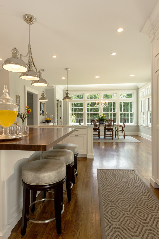 Inspiration for a transitional kitchen remodel in New York with two islands
