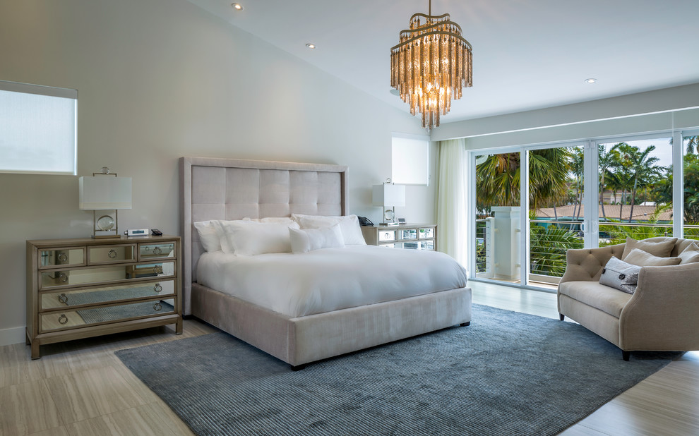 Design ideas for a large contemporary bedroom in Miami with white walls, ceramic floors and no fireplace.