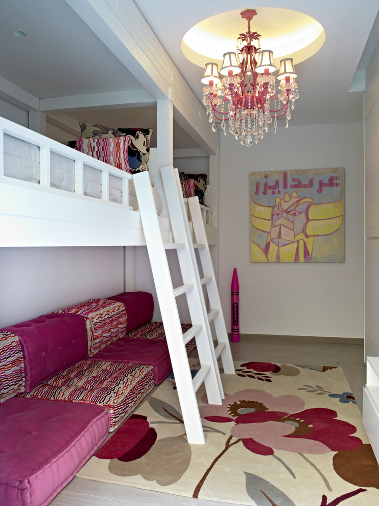 Design ideas for a contemporary kids' bedroom for kids 4-10 years old and girls in Other with white walls.