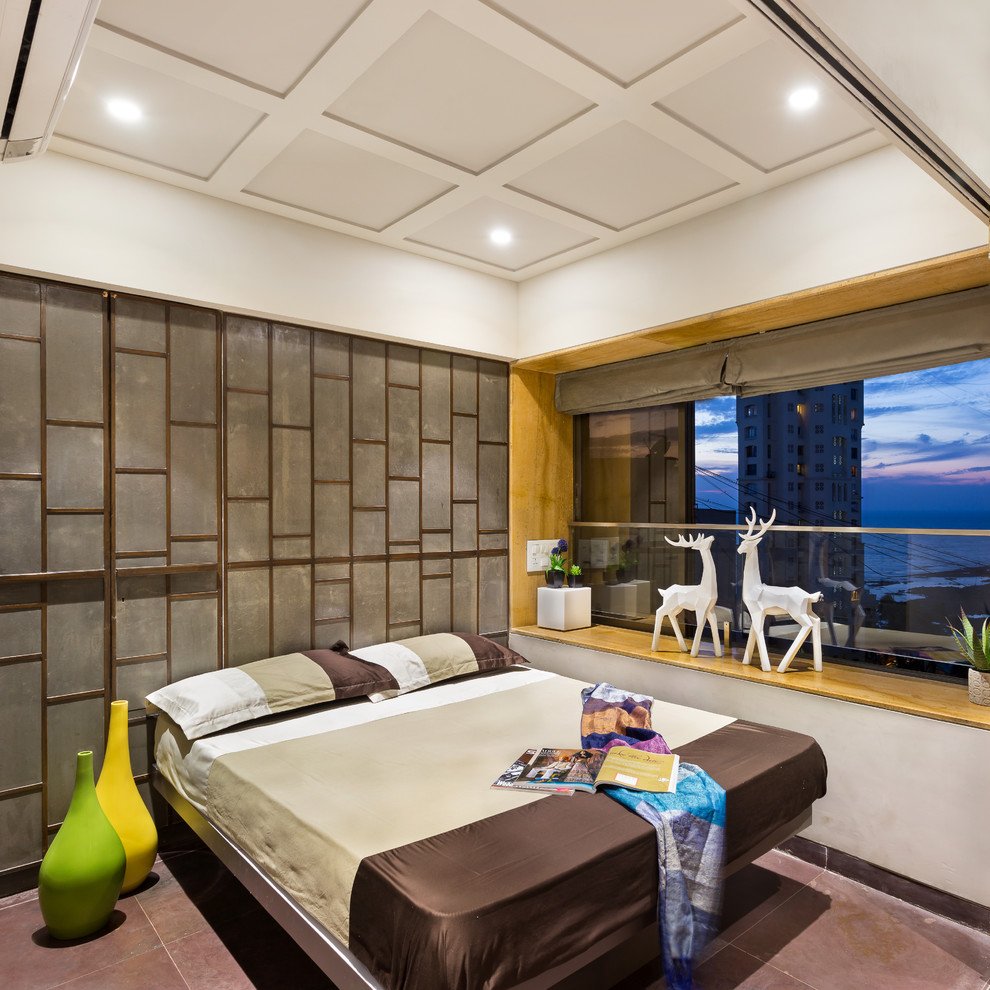 Design ideas for a small contemporary bedroom in Mumbai.