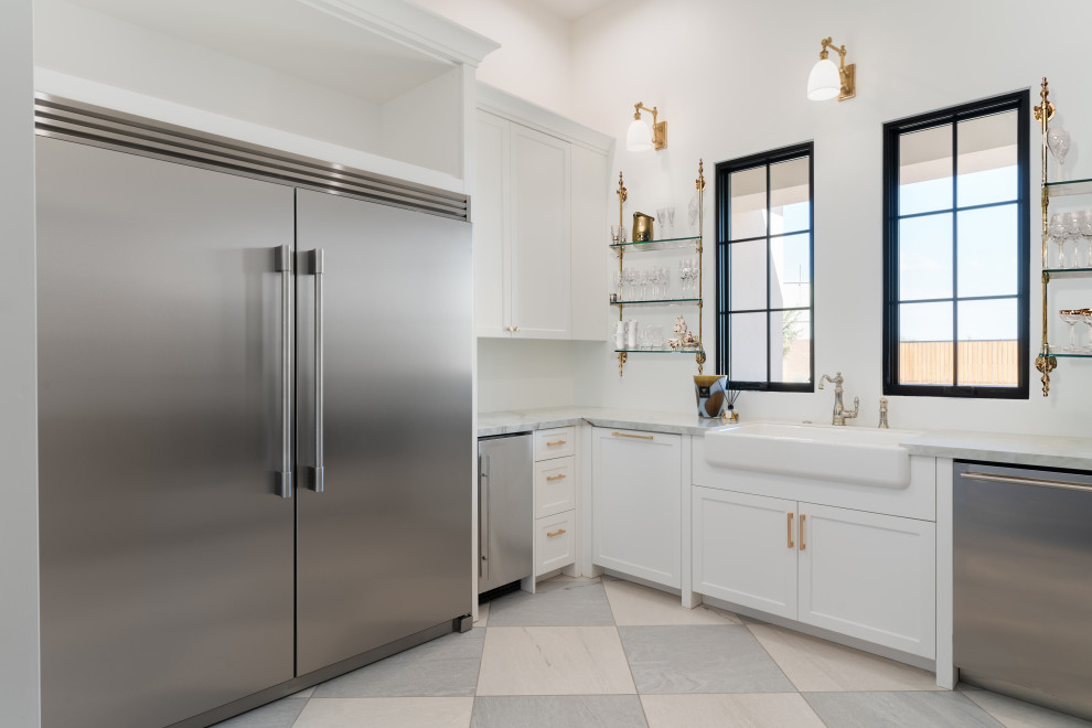 Example of a large transitional open concept kitchen design in Phoenix with shaker cabinets, beige cabinets and two islands