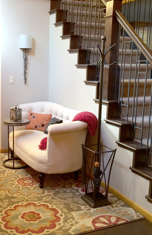 Inspiration for a mid-sized transitional dark wood floor front door remodel with gray walls