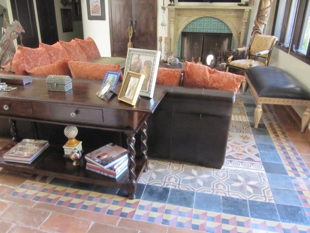 Example of a tuscan living room design in Other