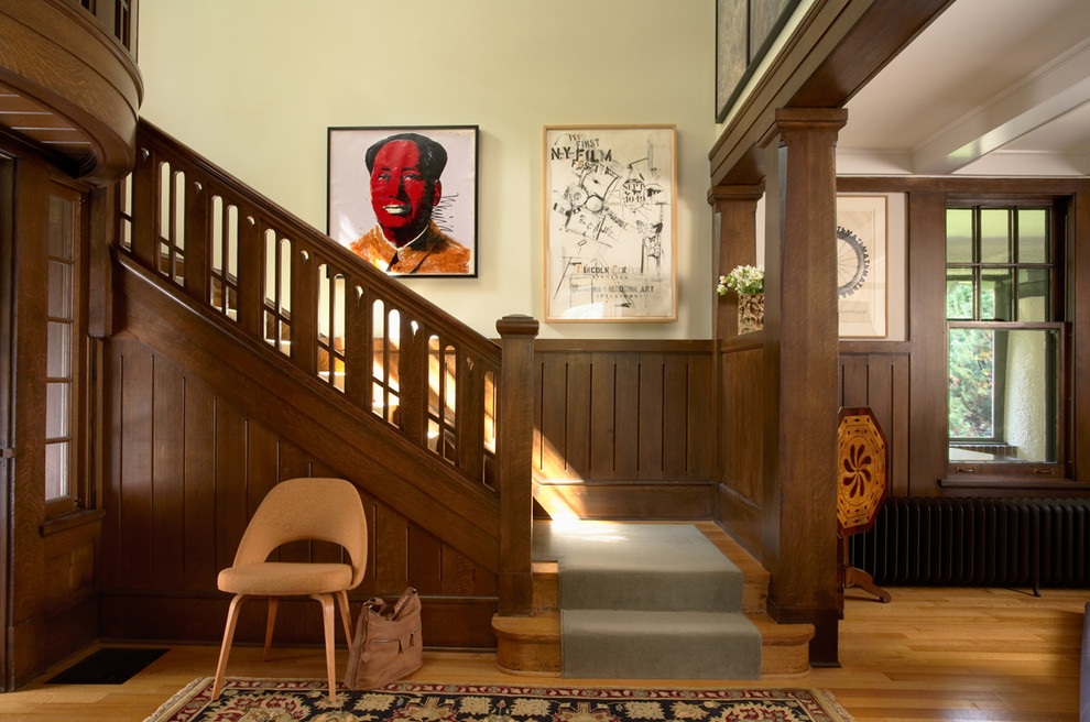 Design ideas for an arts and crafts wood l-shaped staircase in Minneapolis with wood risers.