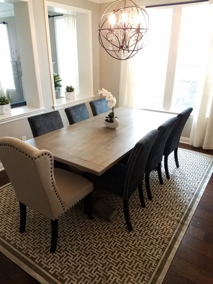 Enclosed dining room - large transitional dark wood floor and brown floor enclosed dining room idea with gray walls and no fireplace