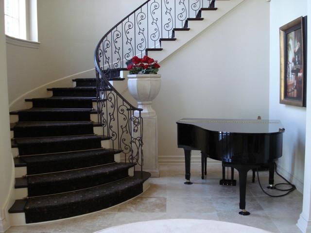 Staircases featuring runners and Zoroufy stair rods klassisch-treppen