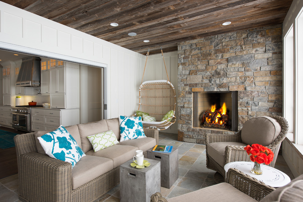 Photo of a beach style sunroom in Other with a standard fireplace and a standard ceiling.