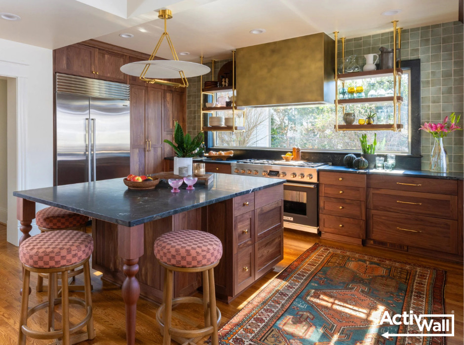 Open concept kitchen - mid-sized eclectic u-shaped medium tone wood floor and brown floor open concept kitchen idea with recessed-panel cabinets, brown cabinets, green backsplash, ceramic backsplash, stainless steel appliances, an island and black countertops
