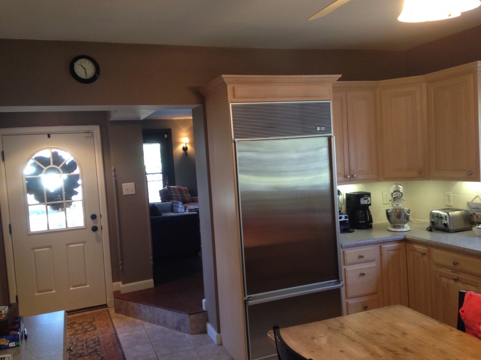 Open up kitchen wall to former garage