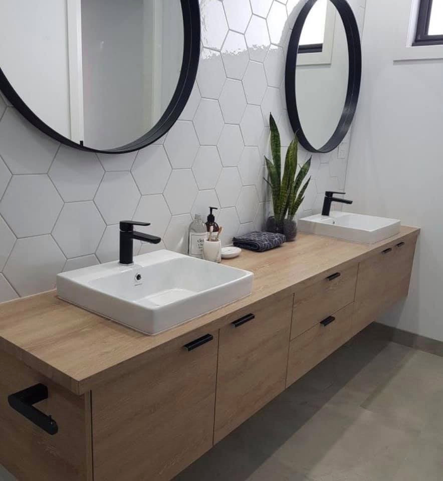 Mid-sized modern master bathroom in Austin with flat-panel cabinets, light wood cabinets, white tile, porcelain tile, white walls, concrete floors, a drop-in sink, wood benchtops, grey floor and brown benchtops.