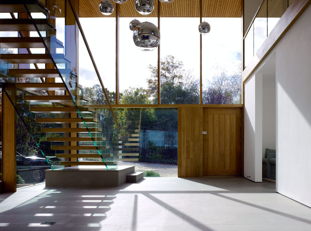 Inspiration for a contemporary entryway in Sussex.