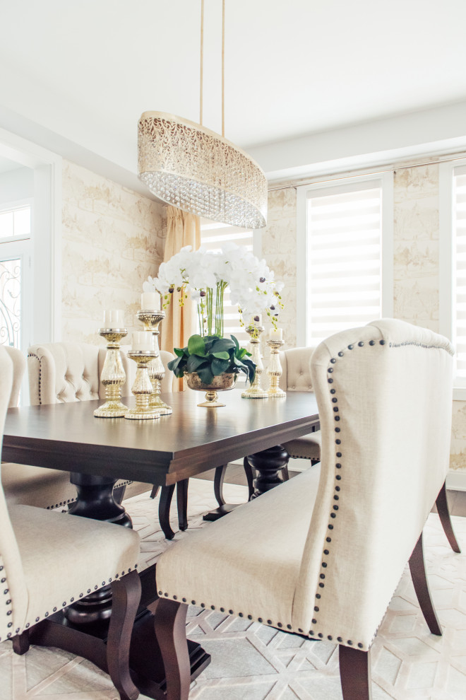 Example of a transitional home design design in Toronto