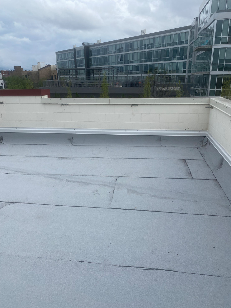 Replacement Flat roof with new decking Bucktown Chicago