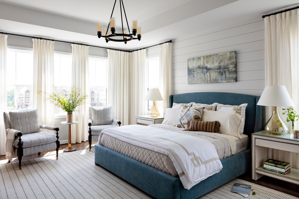 Design ideas for a large country master bedroom in DC Metro with white walls, dark hardwood floors and brown floor.