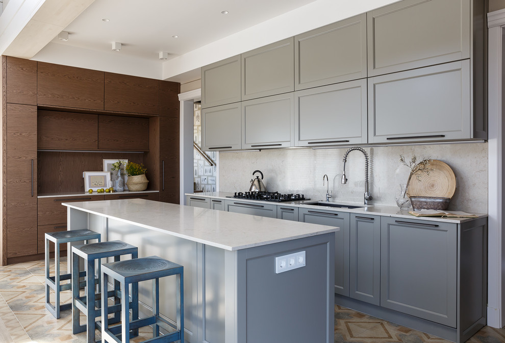 Large contemporary single-wall eat-in kitchen in Saint Petersburg with an undermount sink, grey cabinets, marble benchtops, beige splashback, marble splashback, panelled appliances, ceramic floors, with island, beige floor, beige benchtop and shaker cabinets.