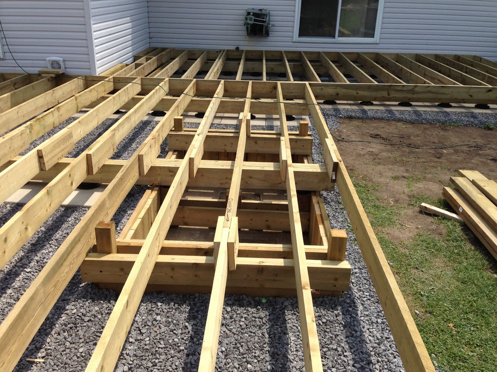 Example of a huge transitional backyard deck design