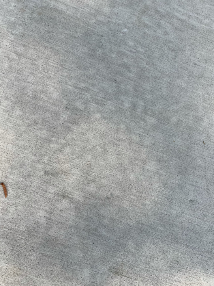Spotty concrete new driveway