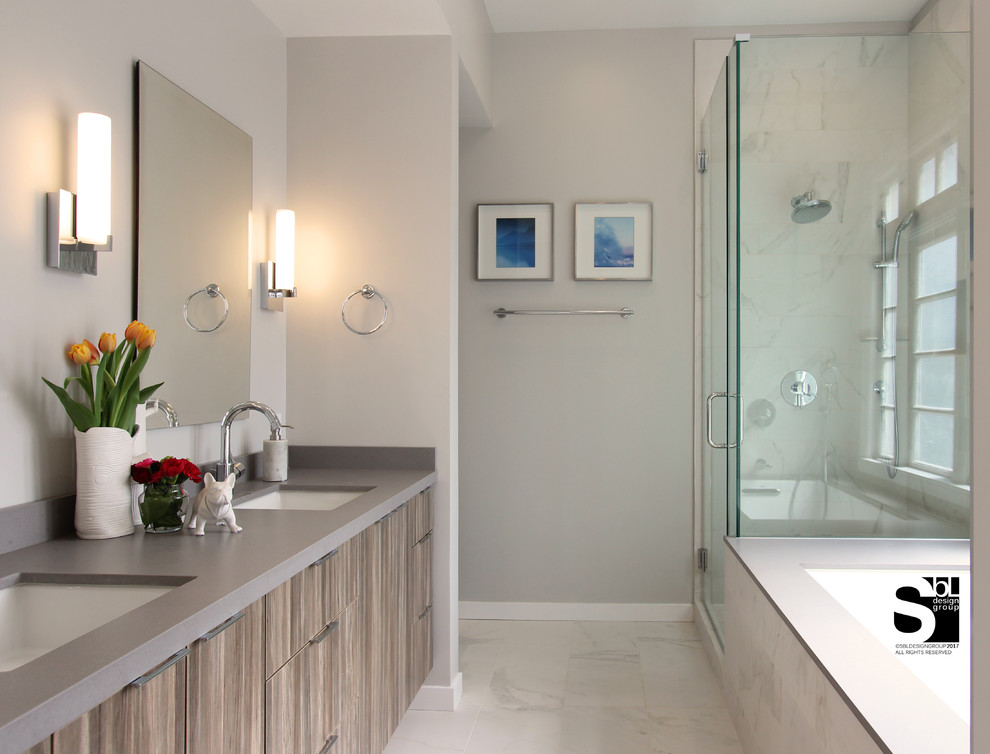 Mid-sized modern master bathroom in San Francisco with flat-panel cabinets, medium wood cabinets, an undermount tub, a corner shower, grey walls, marble floors, an undermount sink, solid surface benchtops, white floor and a hinged shower door.