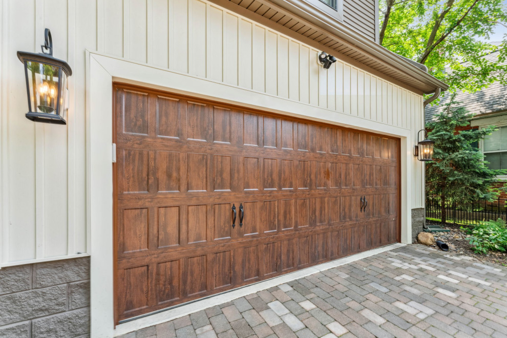 Mid-sized elegant attached two-car garage photo in Columbus