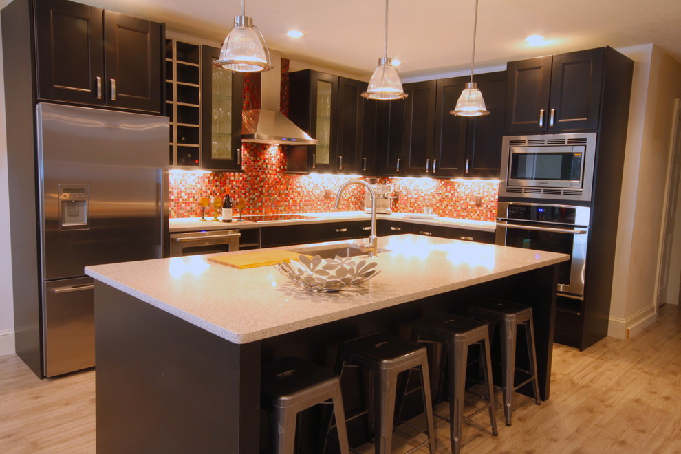 This is an example of a small transitional kitchen in Minneapolis.