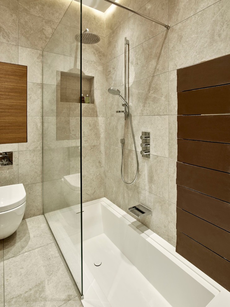Inspiration for a mid-sized contemporary master bathroom in London with flat-panel cabinets, medium wood cabinets, an undermount tub, an open shower, gray tile, grey walls, porcelain floors, a wall-mount sink and wood benchtops.