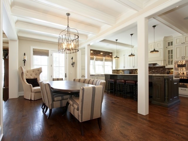 Kitchen/dining room combo - mid-sized transitional dark wood floor kitchen/dining room combo idea in Boston with beige walls
