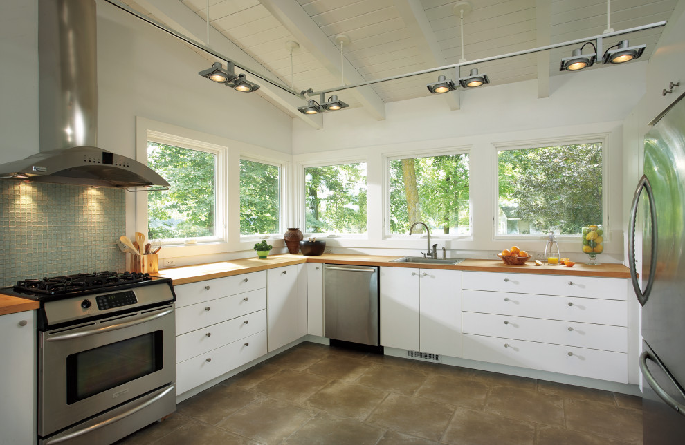Example of a transitional kitchen design in New York