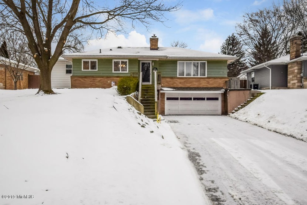 Half brick half siding exterior