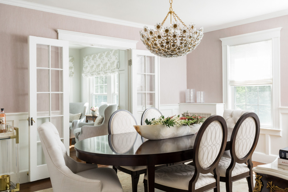 Mid-sized transitional separate dining room in Boston with pink walls, medium hardwood floors and brown floor.