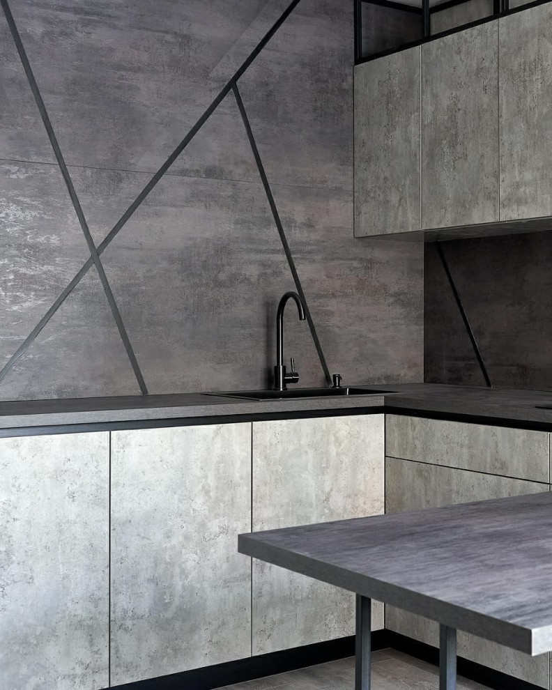 Inredning av ett industriellt mellanstort grå grått kök, med en nedsänkt diskho, luckor med infälld panel, grå skåp, träbänkskiva, grått stänkskydd, stänkskydd i trä, svarta vitvaror, mellanmörkt trägolv, en halv köksö och grått golv