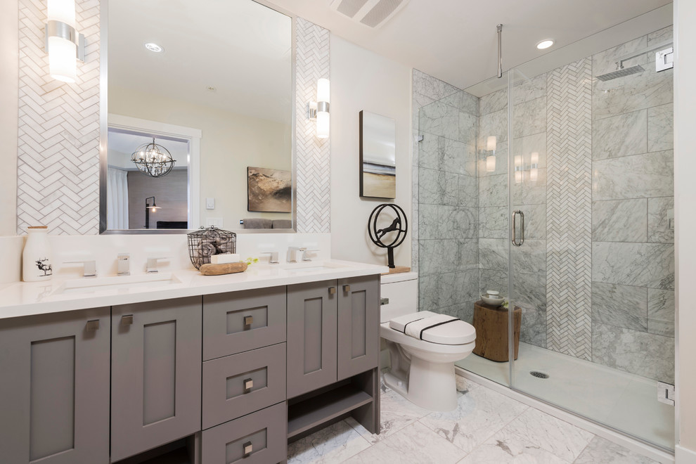 Photo of a mid-sized transitional master bathroom in Vancouver with shaker cabinets, grey cabinets, an open shower, a one-piece toilet, gray tile, white walls, an undermount sink, mosaic tile and a hinged shower door.
