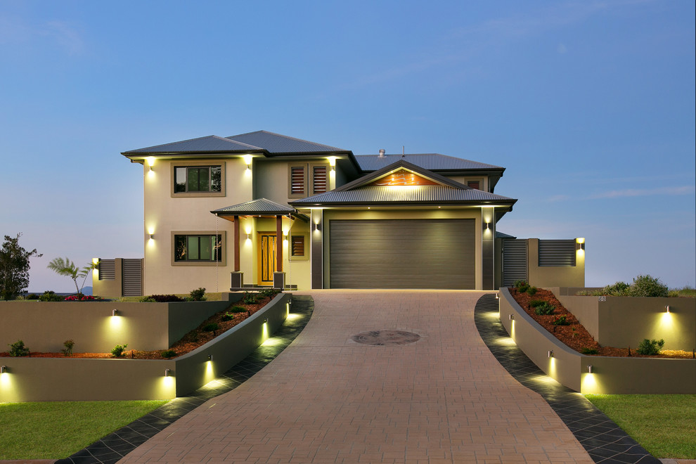 Inspiration for a contemporary two-storey exterior in Cairns.