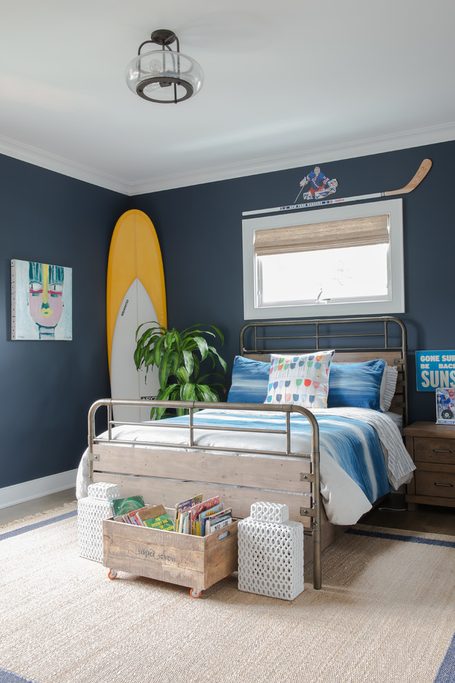 Design ideas for a beach style bedroom in New York with blue walls.