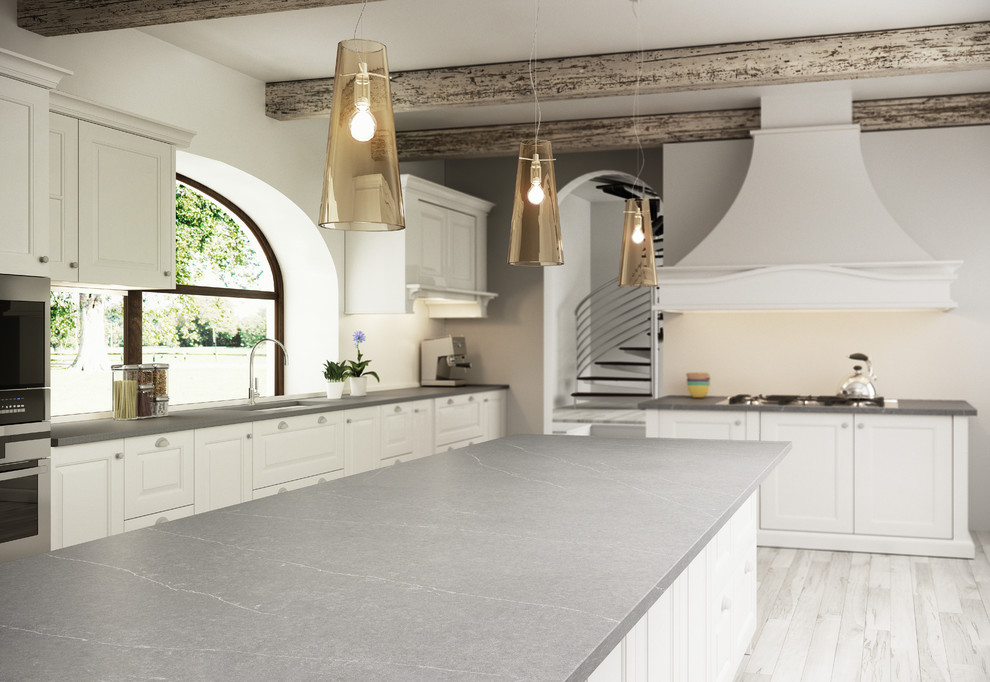 Kitchen - transitional kitchen idea with quartz countertops and gray countertops