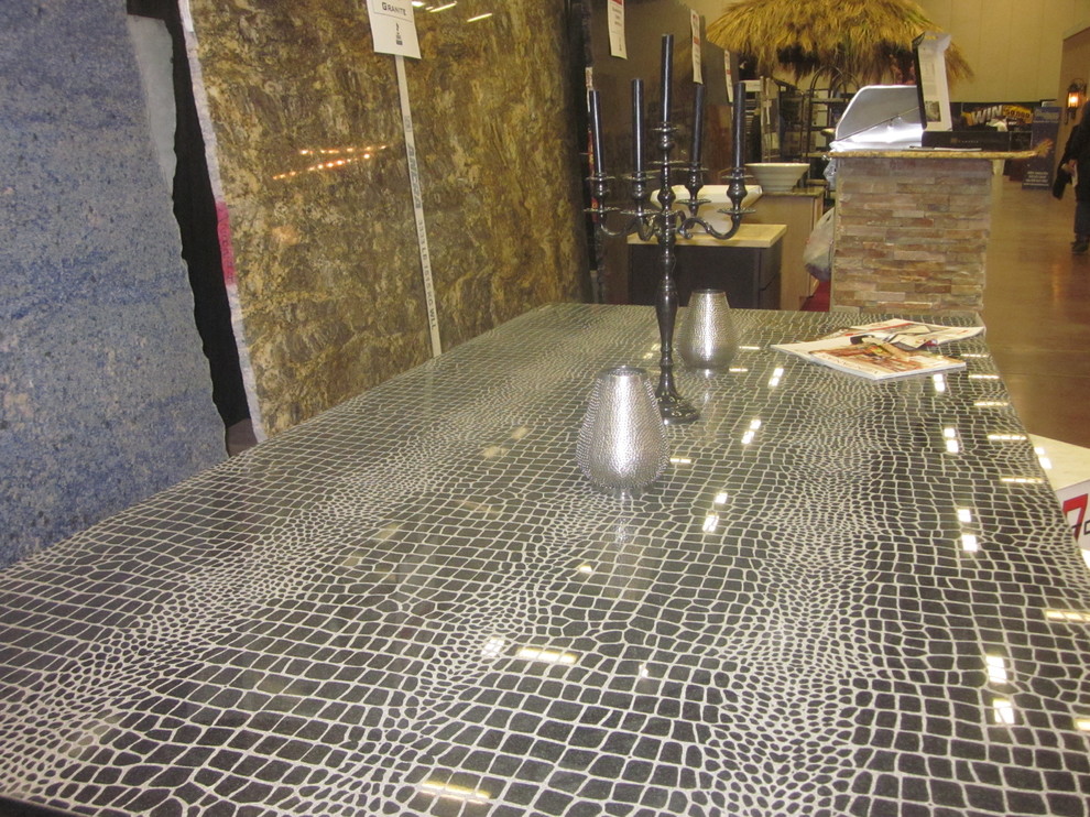 Kitchen photo in Austin with granite countertops