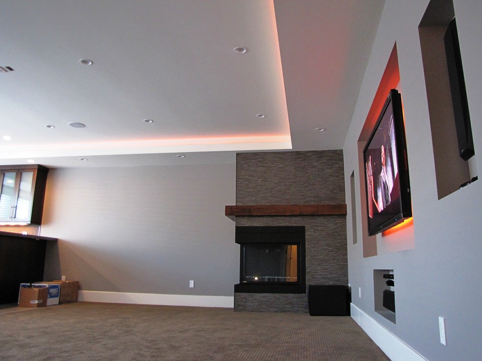 Inspiration for a modern home theatre in Vancouver.