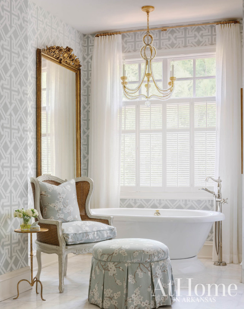 Design ideas for a transitional bathroom in Little Rock with a freestanding tub.