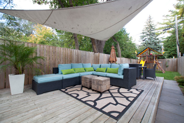 This is an example of a contemporary deck in Toronto.