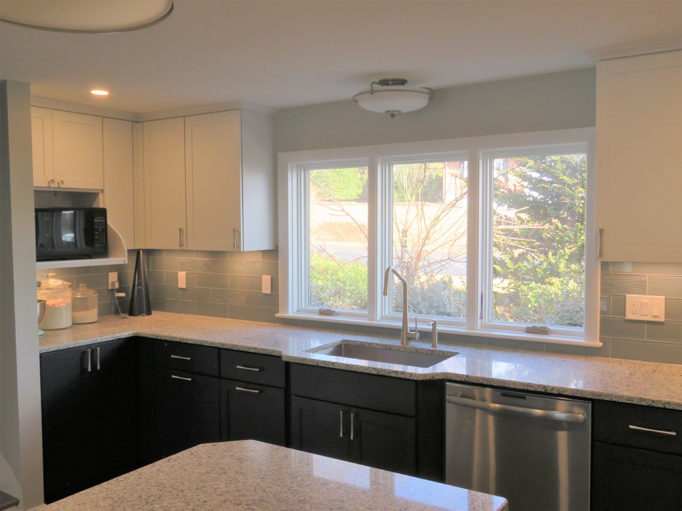 Example of a transitional home design design in Boston