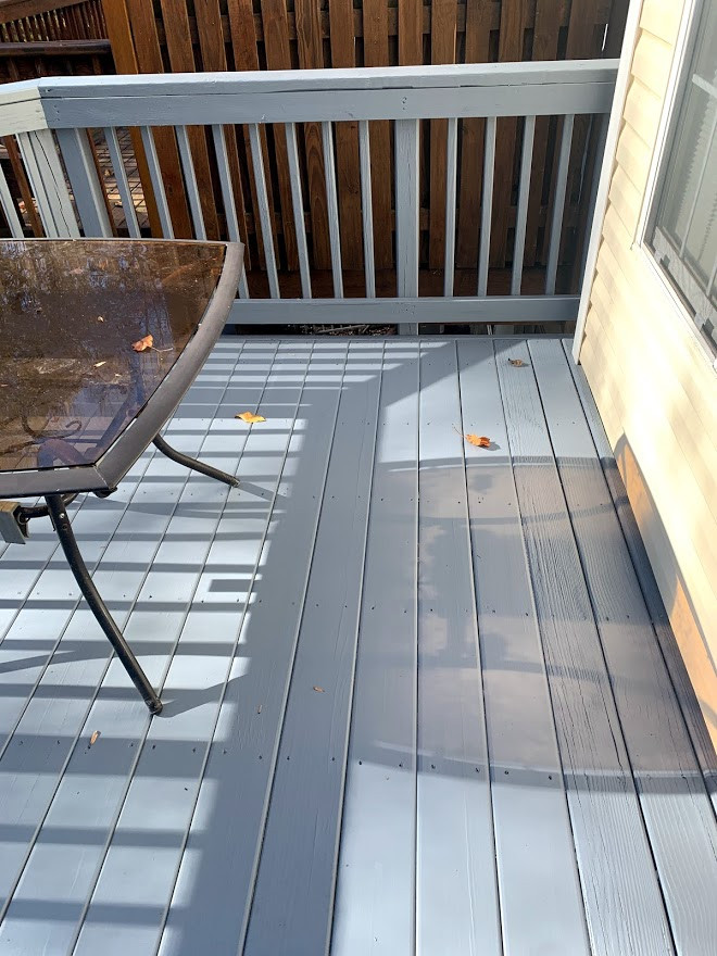 Mid-sized minimalist second story wood railing deck photo in Baltimore