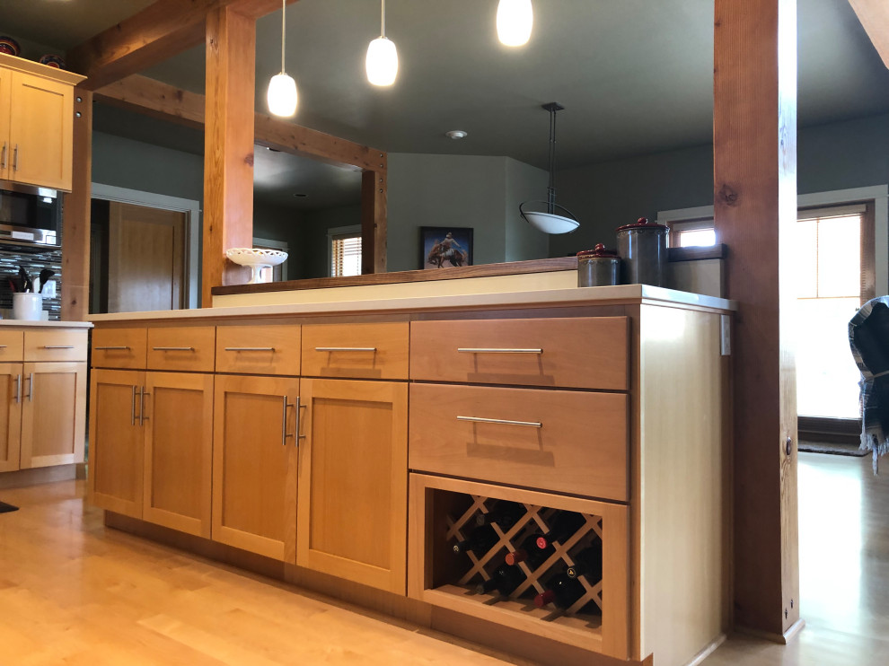 Open concept kitchen - mid-sized transitional l-shaped medium tone wood floor open concept kitchen idea with an undermount sink, flat-panel cabinets, light wood cabinets, quartz countertops, multicolored backsplash, ceramic backsplash, stainless steel appliances, an island and white countertops